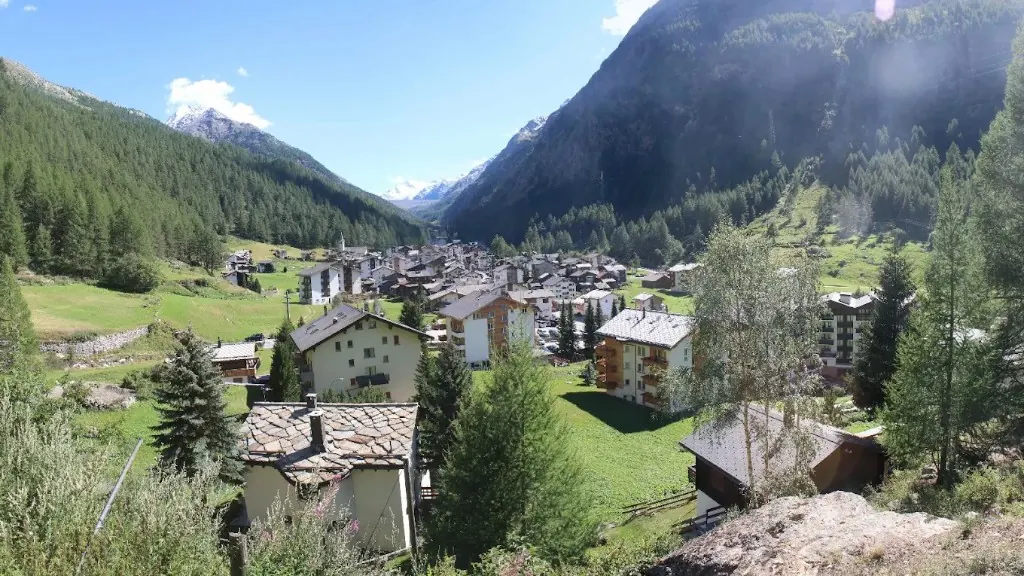 Saas-Almagell village in the Saas Valley, surrounded by forested slopes and alpine peaks